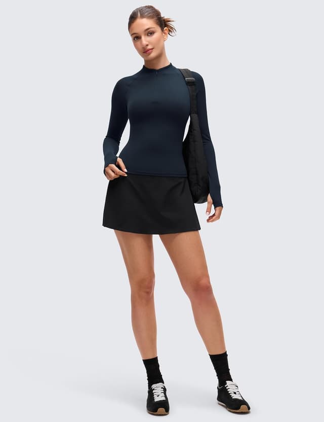 Detalle de CRZ YOGA Softembrace quarter-zip long sleeve top with thumb holes