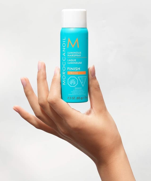 Detalle de Moroccanoil Laque Lumineuse : la laque sans rinçage pour calmer les frisottis