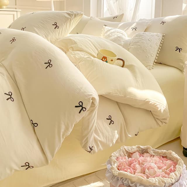 Detalle de Parure de lit adulte Covebett réversible 220x240 cm blanc et jaune nœud papillon avec fermeture éclair