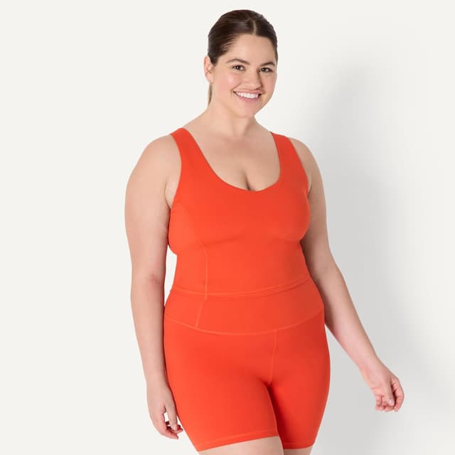 Detalle de Amazon Essentials Canotta tecnica corta FormFlex con reggiseno interno, ross brillante, S