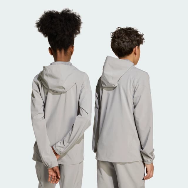 Detalle 2 de adidas Chaqueta Tiro 25 Competition Vis Tech Travel para adolescentes (gris)