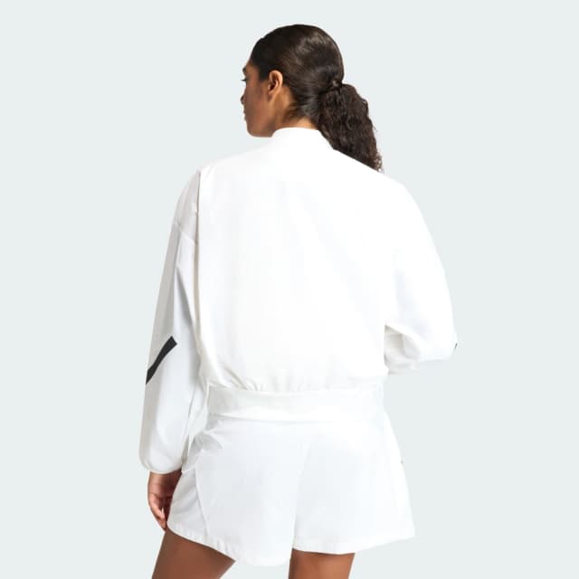 Detalle 2 de Chaqueta bomber de tejido técnico adidas Z.N.E. blanca