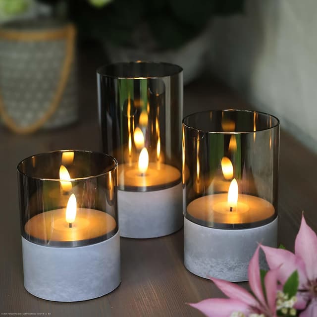Detalle de Hellum candele LED con timer grigio, set da 3 (10/12,5/15 x 8 cm, HxØ) 151992