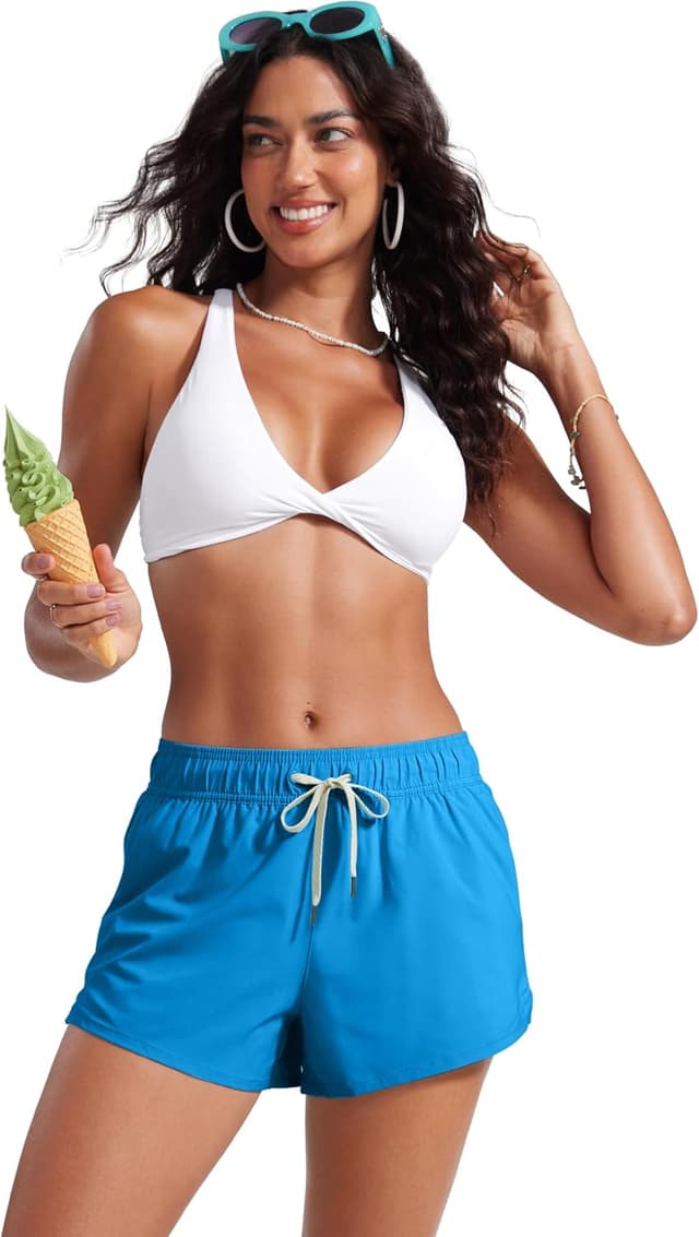 Detalle de Short de bain femme CRZ YOGA 3" à fente latérale, séchage rapide et doublure