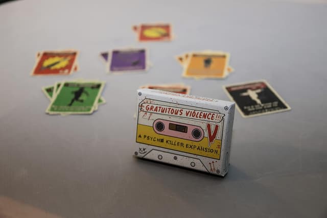 Detalle de Escape Tabletop Games Psycho Killers Gratuitous Violence Expansion (expansion for Psycho Killer!)