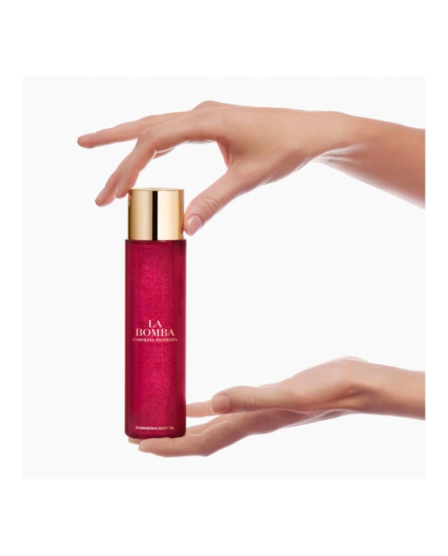 Detalle de Carolina Herrera La Bomba Brillante Aceite Corporal 150 ml: brillo sedoso con aroma icónico