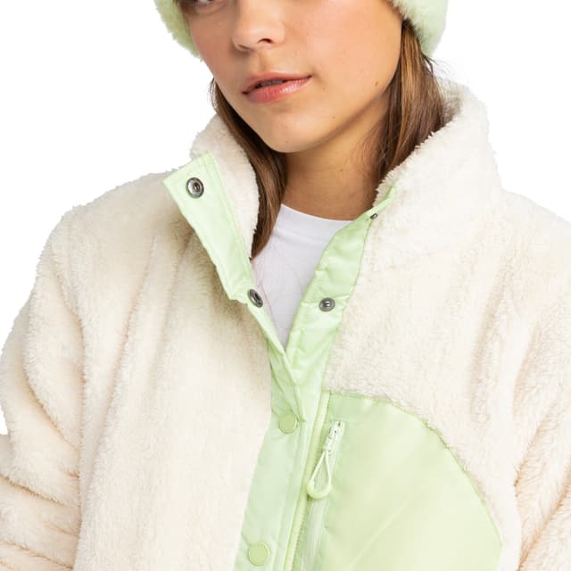 Detalle de Roxy Alabama: forro polar de mujer con cuello alto y tecnología WarmFlight