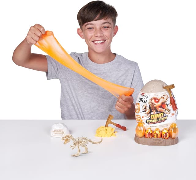 Detalle de ROBO ALIVE Fossil Find Amber Adventure di ZURU con Triceratops, scatola da scoprire e dinosauro giocattolo