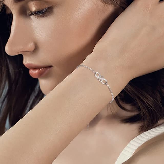 Detalle 2 de VANSZA Damen-Armband aus 925 Sterling Silber mit Unendlichkeits- und Herzsymbol