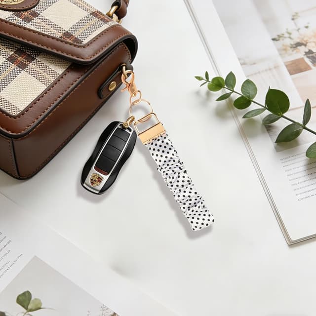 Detalle 2 de Schlüsselanhänger Armband Leopardenmuster mit Band