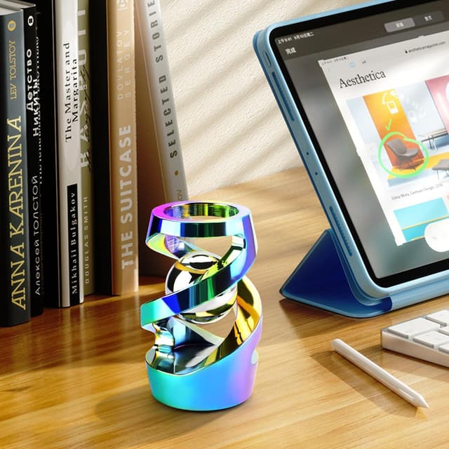 Detalle 2 de DOLASEV Upgraded Kinetic Desk Toys (Rainbow) — Metal fidget spinning toy for stress and focus