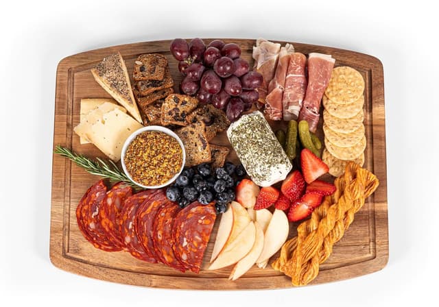 Detalle 2 de Picnic Time NCAA Oval Acacia Cutting Board & Charcuterie Set with Juice Groove