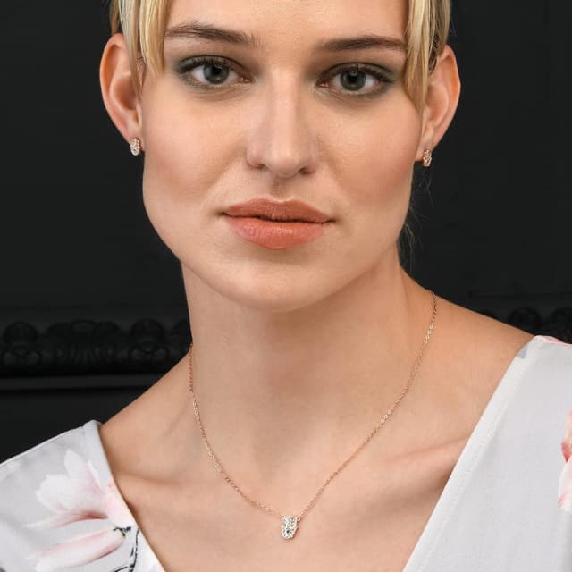 Detalle de Diamond Treats collier Khamsa Main de Fatma en argent 925 plaqué or rose, pendentif zircone bleu