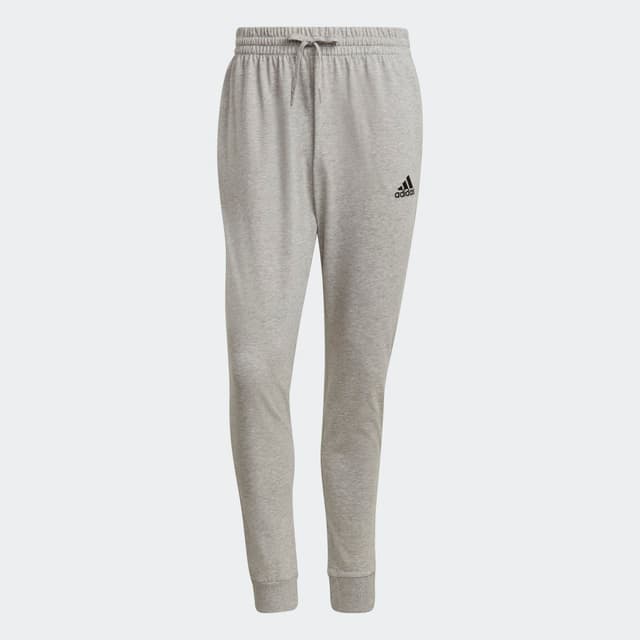 Detalle de Pantalón Essentials Single Jersey Tapered Cuff de adidas en gris