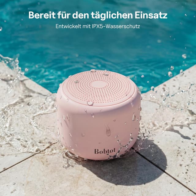 Detalle de Bobtot Tragbarer Bluetooth-Lautsprecher mit wasserdichtem Design, Stereo-Sound und 15 Stunden Laufzeit (Rosa)