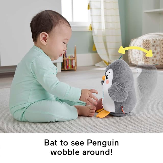 Detalle 2 de Fisher-Price Baby Tummy Time Toy Flap & Wobble Penguin (HNC10) plush with music & motion