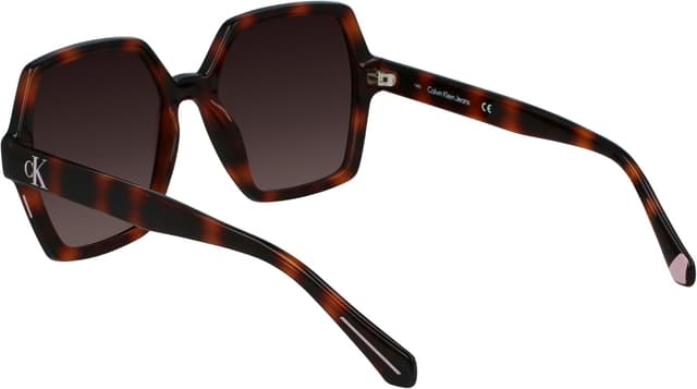 Detalle de Calvin Klein CKJ21629S N occhiali da sole da donna con lenti degradanti UV