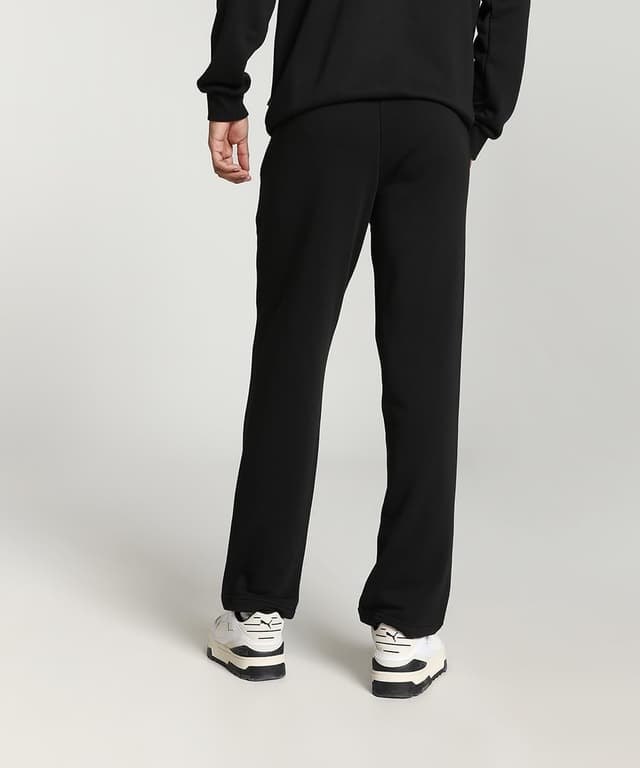 Detalle de PUMA ESS Logo Pants TR OP SRL : sweatpants homme à coupe droite, en fibres recyclées