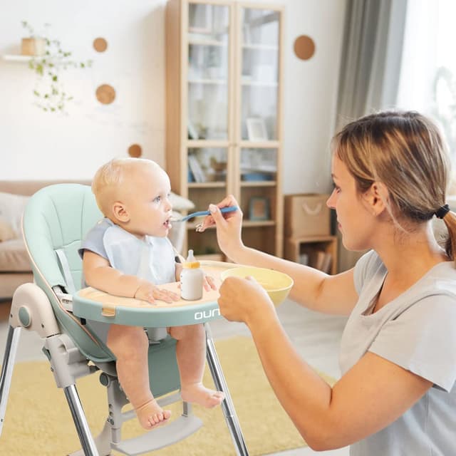 Detalle de OUNUO Baby Hochstuhl verstellbar, klappbar und mit Sicherheitsgurt (6 Monate bis 3 Jahre), grün