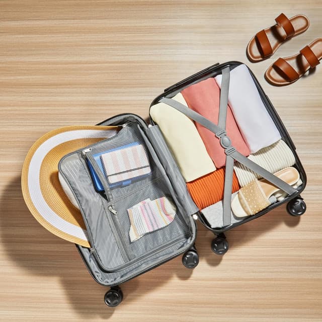 Detalle de Amazon Basics Maleta de Mano Rosada con Ruedas Giratorias ✈