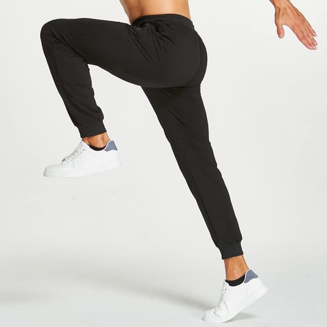 Detalle de ZOXOZ Pantaloni sportivi uomo in cotone con elastico in vita e tasche con zip