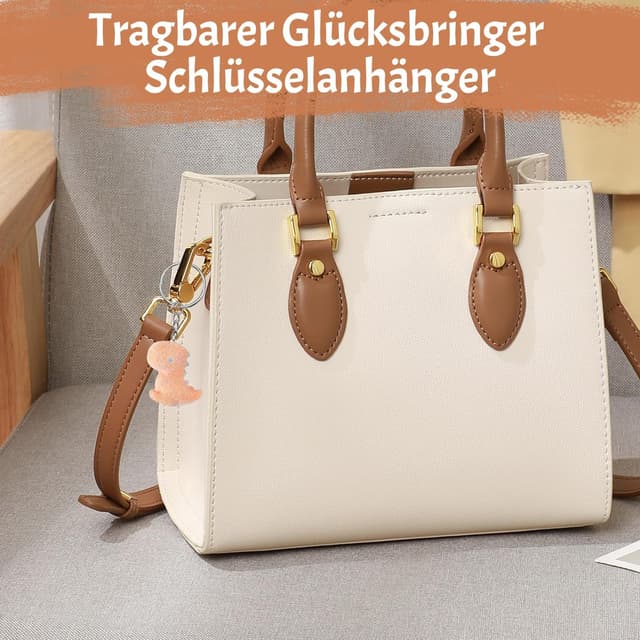 Detalle de Komergave Pocket Hug Dino Schlüsselanhänger mit Karte – Glücksbringer für die Einschulung