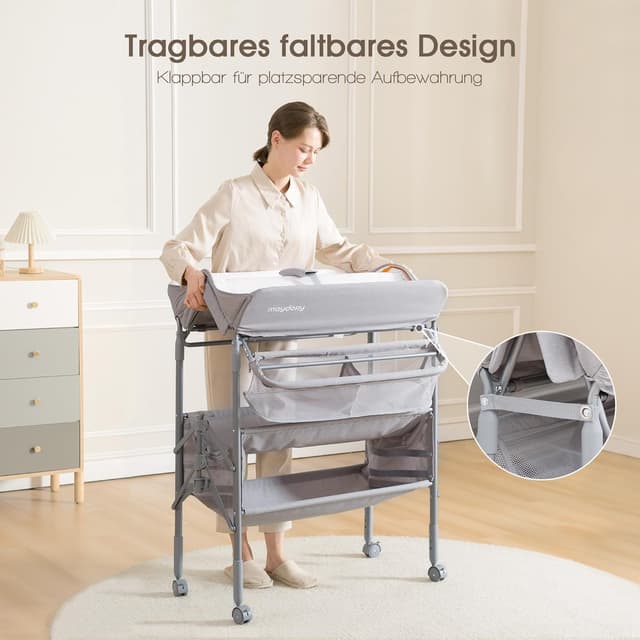 Detalle de Maydolly tragbarer Wickeltisch – faltbar, höhenverstellbar, mit Rädern und wasserabweisendem Sitzkissen (Grau)