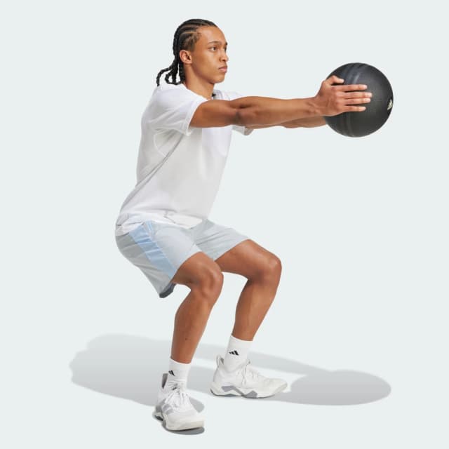 Detalle de adidas Pantalón corto Train Essentials Woven Mélange