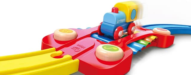 Detalle 1 de Hape E3826 Pista treno arcobaleno in legno con xilofono e tamburello (dai 18 mesi)