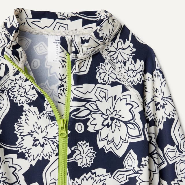 Detalle de Amazon Essentials Mixte bébé rashguard une pièce à manches longues