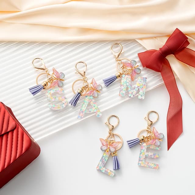 Detalle de MORSUNBELA Schlüsselanhänger für Mädchen mit Anfangsbuchstabe und Schmetterling