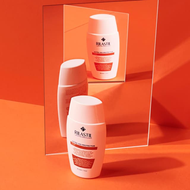 Detalle de Rilastil Fluid 100 – feuchtigkeitsspendende, schützende Emulsion mit ultraleichter Textur (50 ml)