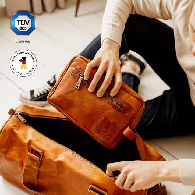 Detalle de Berliner Bags Vintage Kulturbeutel Paul aus Leder – braune Kulturtasche für Damen & Herren (28 x 19 x 10 cm)