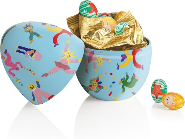 Detalle de Venchi tirelire en métal avec 9 petits œufs au chocolat (100 g) – Collection Printemps