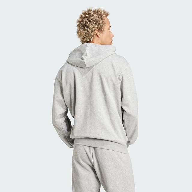 Detalle 2 de adidas Essentials Hoodie sudadera hombre M 70% ♻