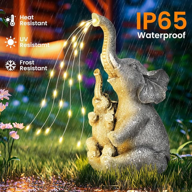 Detalle de GIGALUMI Solar Garden Statues Embrace Elephant figurine with solar lights for outdoor patio and yard decor