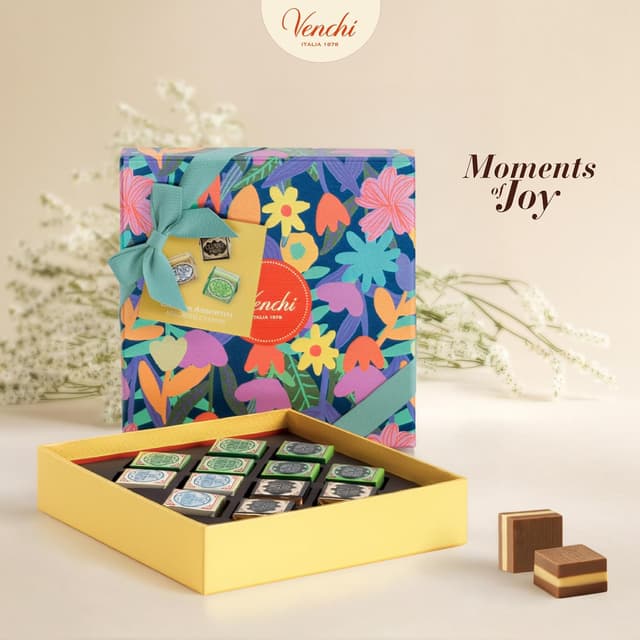 Detalle de Coffret Printemps Venchi avec 12 Cremino sans gluten (135 g) – collection illustrée Teresa Rego
