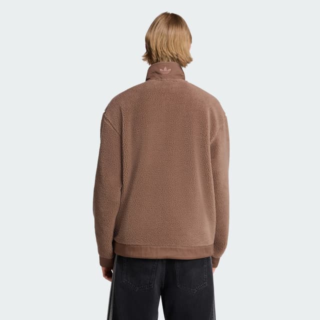 Detalle 2 de Chaqueta de forro polar con cremallera Premium Essentials Adidas en color marrón