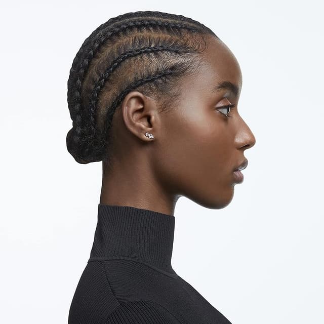 Detalle 2 de Swarovski Mesmera pendientes de botón asimétricos oro rosa 💍