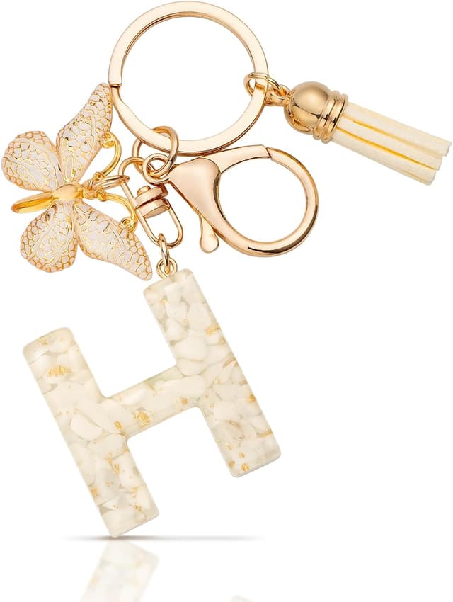 Detalle de MORSUNBELA Schlüsselanhänger mit Buchstabe, Schmetterling & Quaste – personalisiert als Geschenk für Mädchen und Frauen