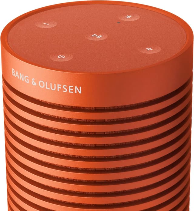 Detalle de Bang & Olufsen Beosound Explore (Bonfire Orange) — enceinte Bluetooth portable étanche IP67, son True360 et jusqu’à 27 h d’autonomie