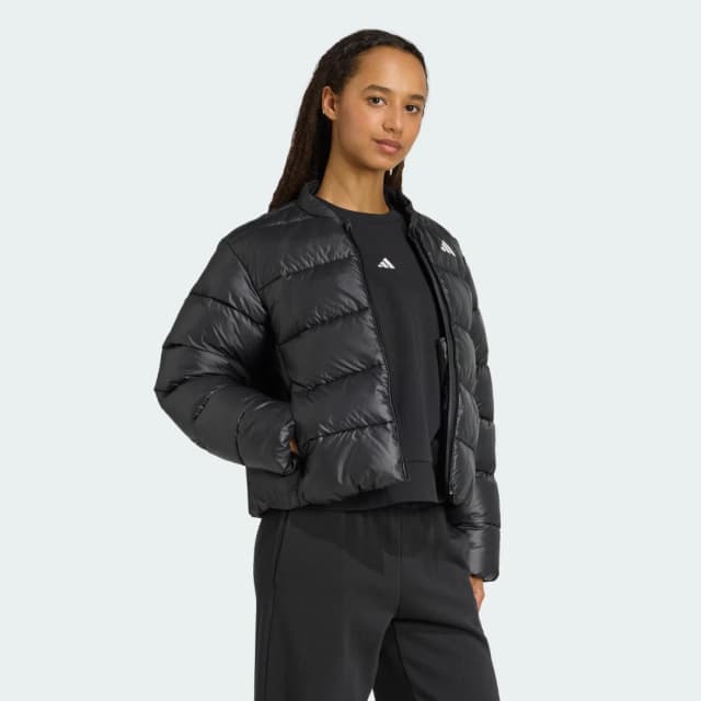 Detalle de adidas Essentials CLIMAWARM chaqueta de plumón sintético negra