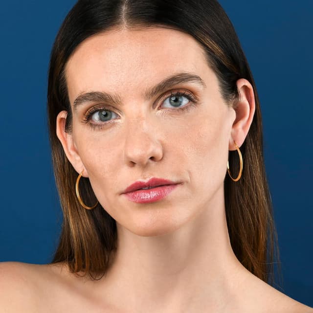 Detalle de Diamond Treats Boucles d’oreilles créoles plaqué or en argent 925 – petits aros brillants avec finition “taille diamant”