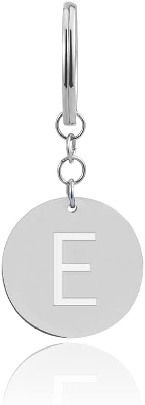 Detalle de GD GOOD.designs EST. 2015 portachiavi a forma di lettera con chip per carrelli della spesa in acciaio inox argento