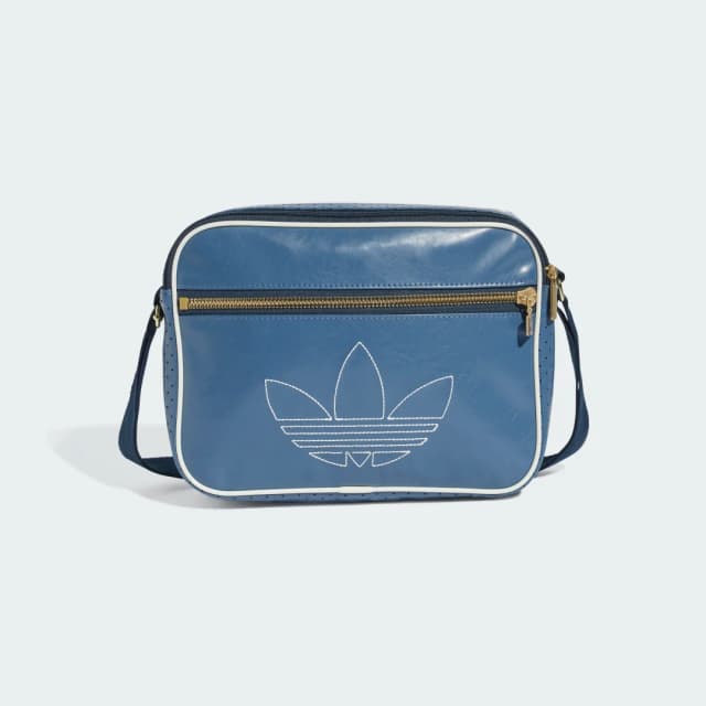Detalle de adidas Minibolso Airliner en azul: un accesorio compacto para el día a día