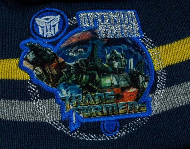 Detalle de Lot de 2 bonnets d’hiver et écharpes Transformers Autobot Optimus Prime (taille 52/54) bleu ou noir pour garçon