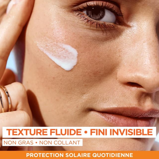 Detalle de Garnier Ambre Solaire Super UV Vitamin C Daily Fluid gegen dunkle Flecken (LSF 50+, unsichtbares Finish), 40 ml