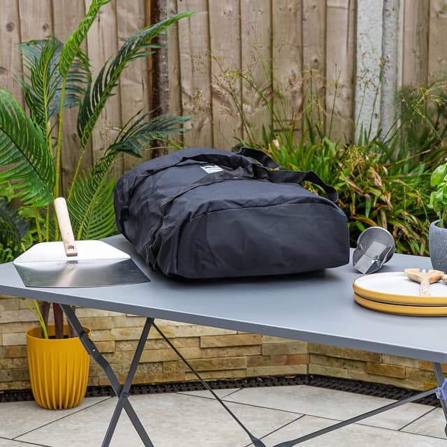 Detalle de Zanussi ZPO1BPC Outdoor 12 Inch Wood Pellet Portable Pizza Oven with Paddle and Cover (Black)