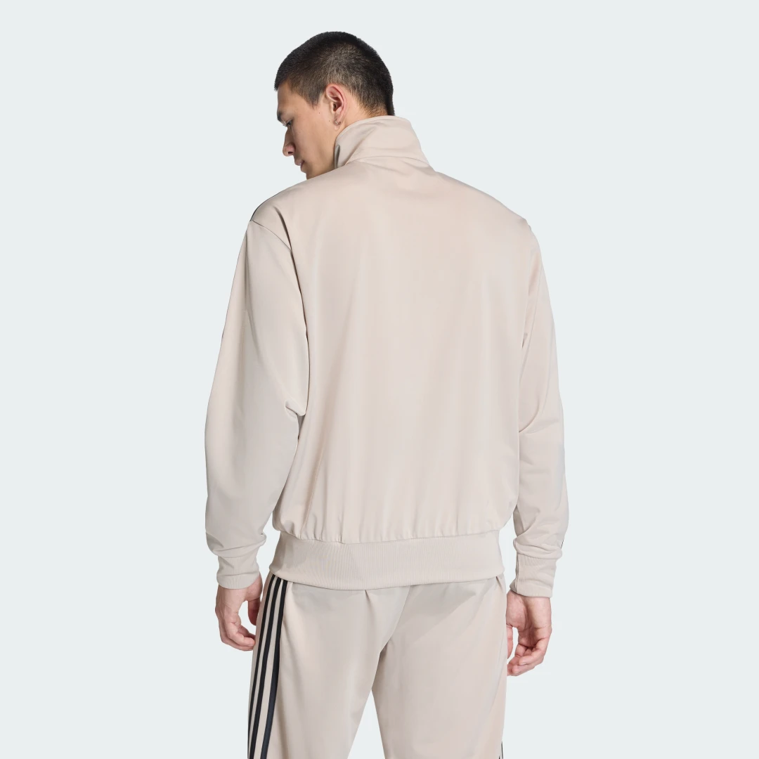 Detalle 2 de Chaqueta Firebird de Adidas – beige, para un uso diario con estilo cómodo