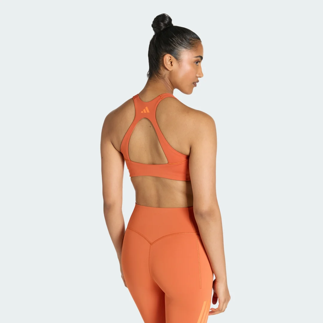 Detalle 2 de Sujetador de entrenamiento Optime 3 Stripes de Adidas – impacto medio, color naranja